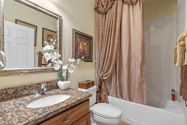 full bathroom featuring vanity, toilet, and shower / bathtub combination with curtain