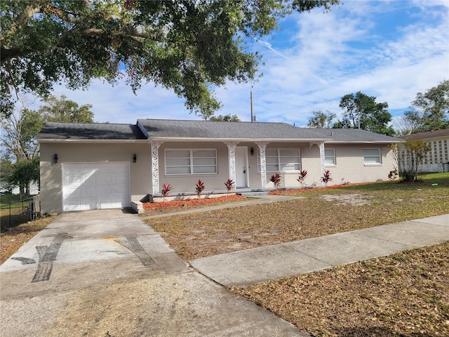 single story home with a garage