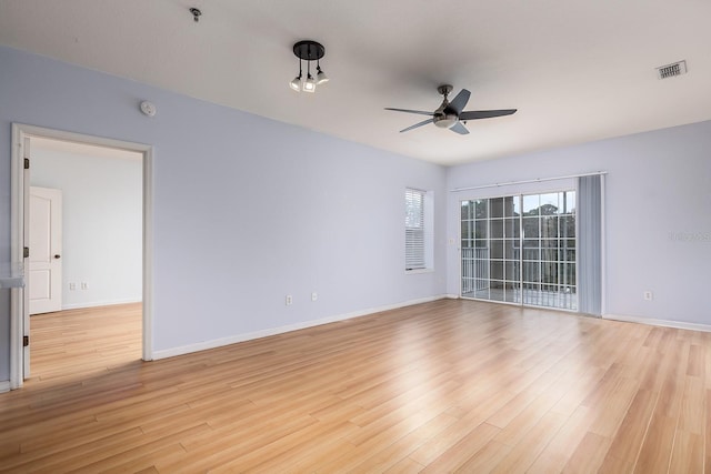 unfurnished room featuring ceiling fan and light hardwood / wood-style floors