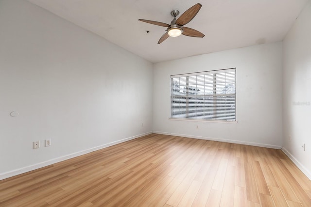 unfurnished room featuring light wood-type flooring and ceiling fan