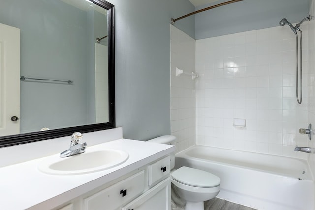 full bathroom with tub / shower combination, toilet, and vanity