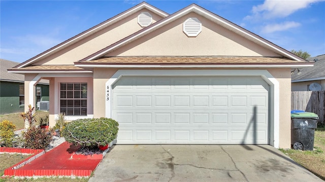 view of property with a garage