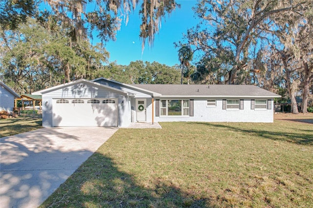 ranch-style home with a front yard and a garage