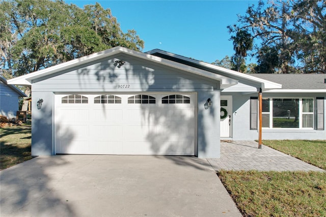 ranch-style house with a garage