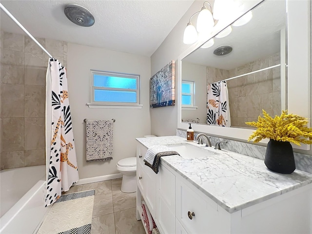 full bathroom featuring shower / tub combo, vanity, a textured ceiling, and toilet