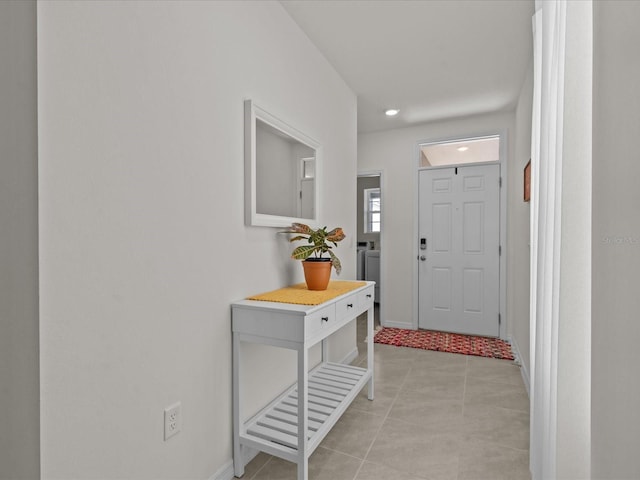 entrance foyer with washing machine and clothes dryer