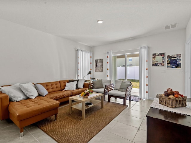 living room featuring light tile patterned floors