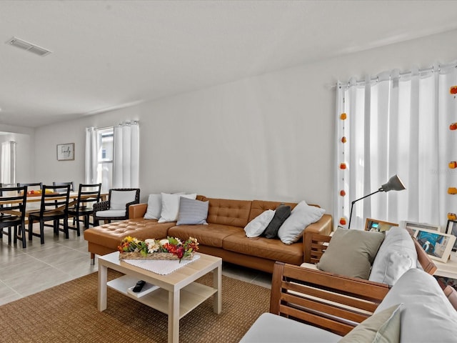 living room with light tile patterned floors