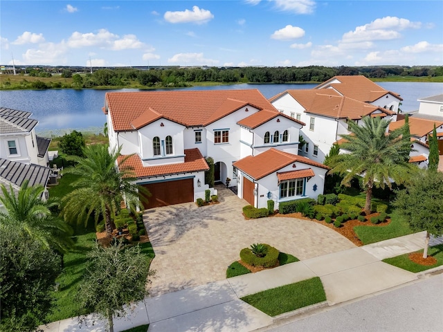 birds eye view of property featuring a water view