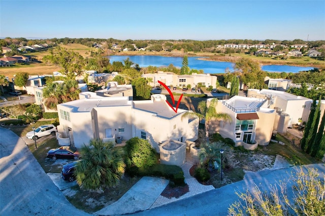 bird's eye view with a water view