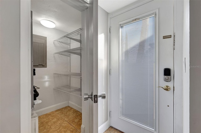 interior space with light tile patterned floors