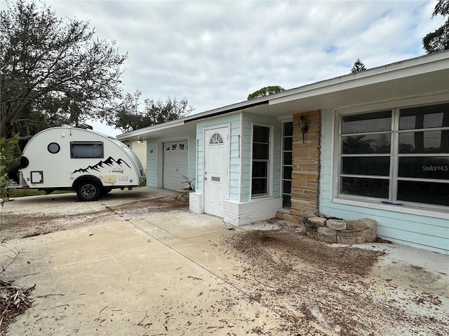 exterior space with a garage