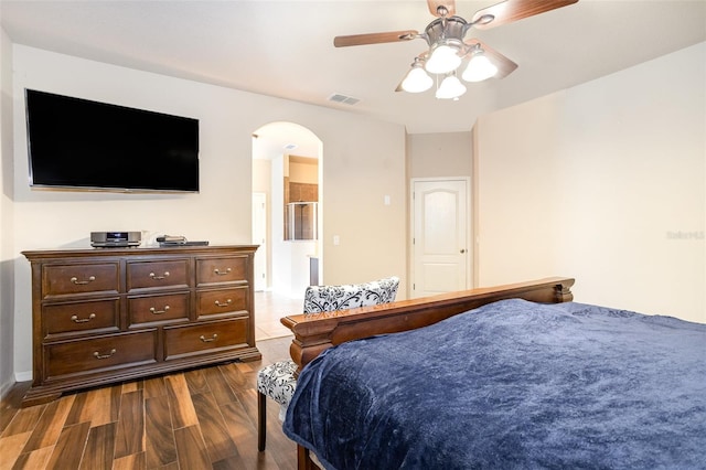 bedroom with ceiling fan and hardwood / wood-style flooring