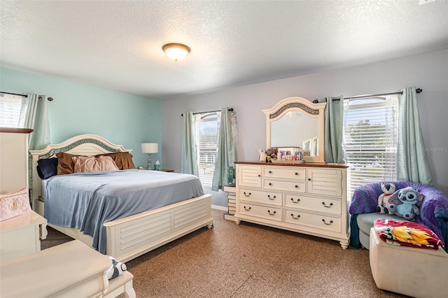 bedroom with a textured ceiling