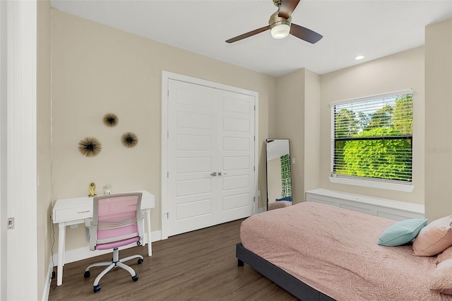 bedroom featuring baseboards, recessed lighting, wood finished floors, a closet, and a ceiling fan