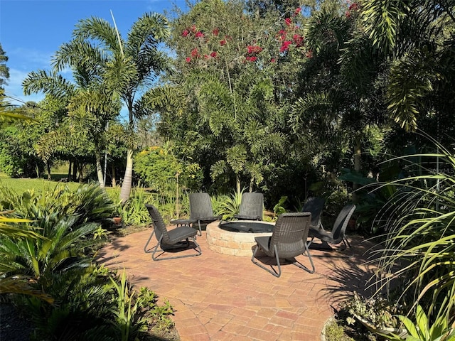 view of patio / terrace with an outdoor fire pit