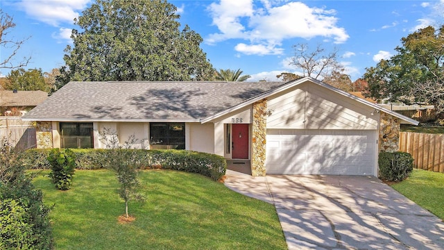 single story home with a front yard and a garage