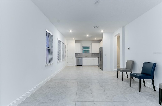 living room featuring light tile patterned flooring