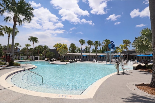 view of swimming pool with a patio area