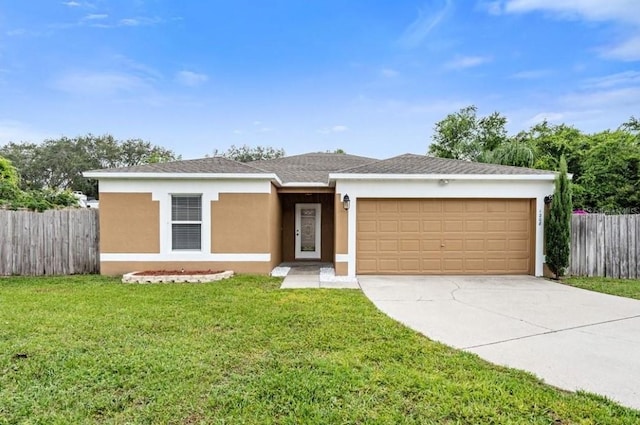 ranch-style home with a garage and a front yard