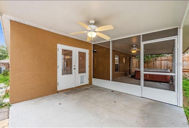 view of patio / terrace with french doors, ceiling fan, and central AC unit