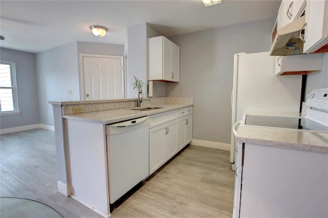 kitchen featuring white dishwasher, sink, light hardwood / wood-style flooring, white cabinetry, and extractor fan