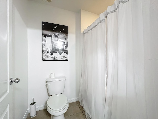6163 Forest Ridge Way, Winter Haven, FL 33881 - full bath with toilet, tile patterned floors, and baseboards