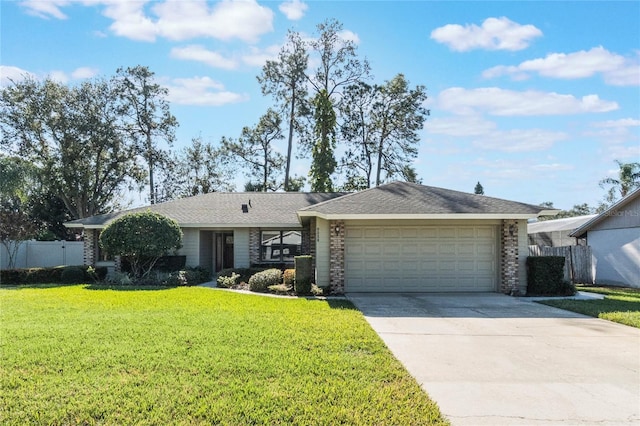 ranch-style house with a front lawn and a garage