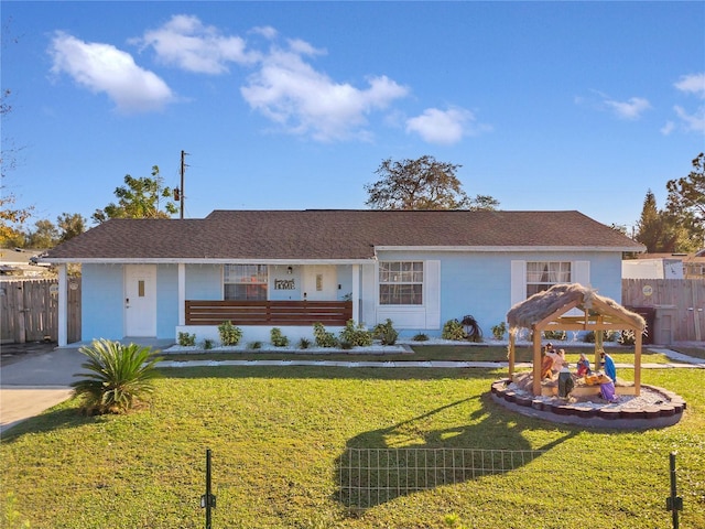 ranch-style house with a front lawn