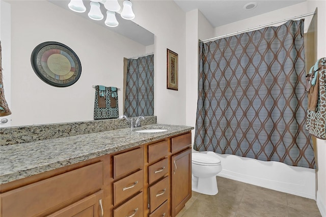 full bathroom featuring tile patterned floors, vanity, toilet, and shower / bath combo