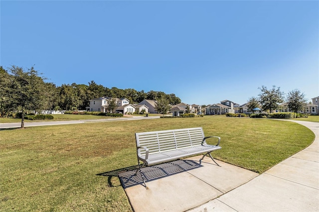 view of community featuring a lawn