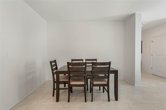 dining room featuring light tile patterned floors