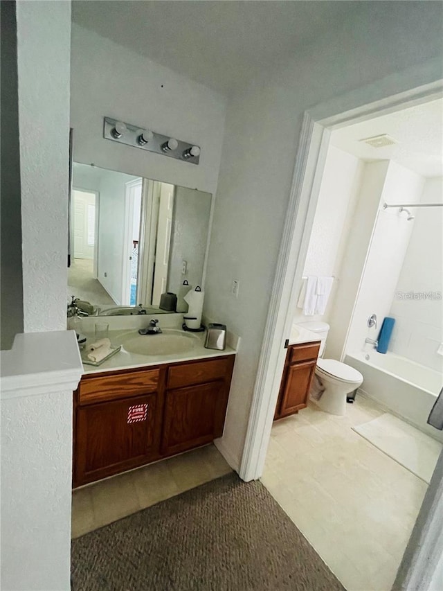 full bathroom with vanity, toilet, and tub / shower combination