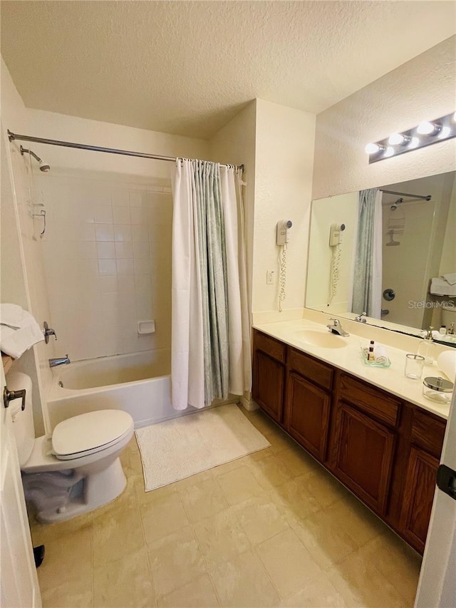 full bathroom featuring shower / bathtub combination with curtain, vanity, a textured ceiling, and toilet