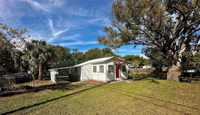 view of yard with a carport