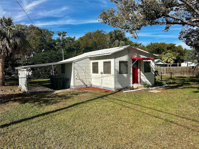 view of outdoor structure featuring a yard