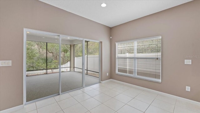 view of tiled empty room