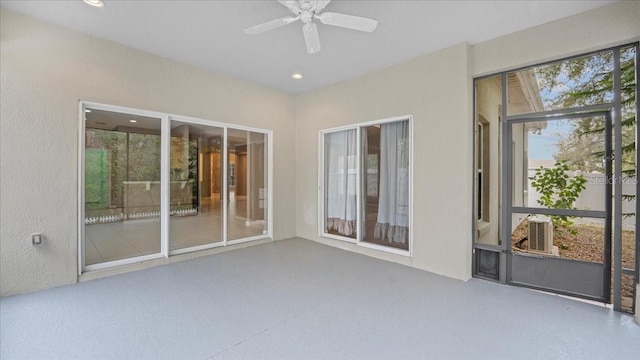 interior space featuring ceiling fan