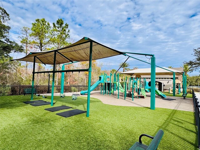 view of play area with a yard