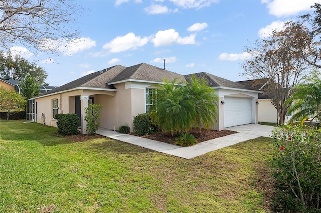 ranch-style home featuring a garage and a front lawn