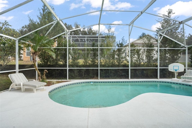 view of pool featuring a lanai and a patio area