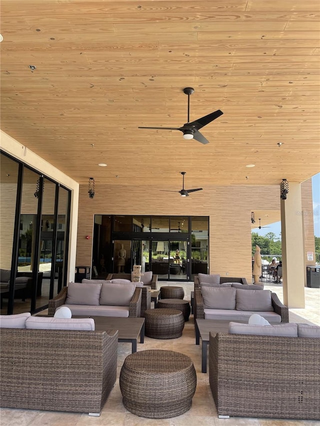 view of patio / terrace with ceiling fan and an outdoor hangout area