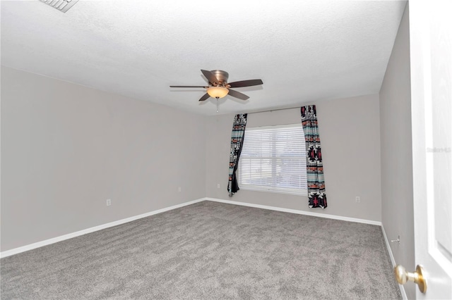 unfurnished room featuring ceiling fan, a textured ceiling, and carpet flooring