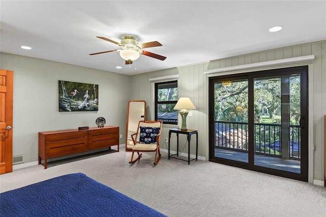 carpeted bedroom with access to outside and ceiling fan