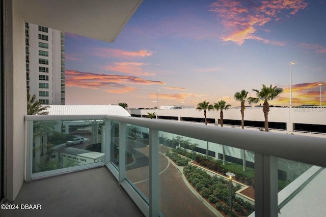 view of balcony at dusk