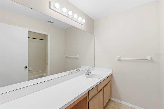 full bathroom with toilet, tile patterned flooring, bathing tub / shower combination, and vanity