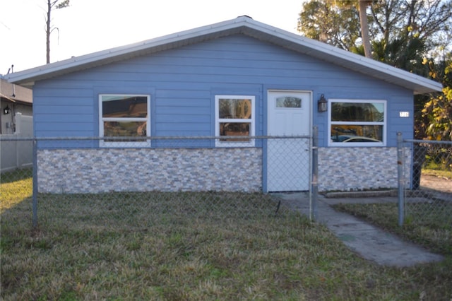 view of front of property with a front lawn