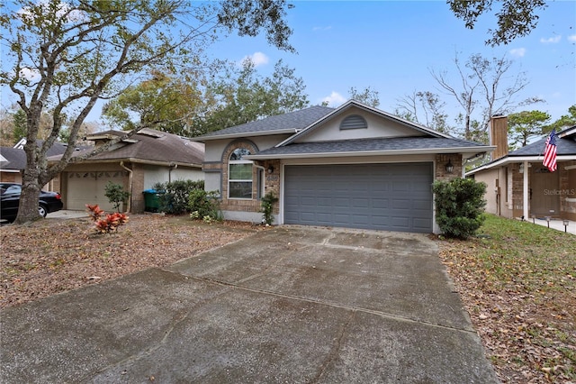 single story home with a garage