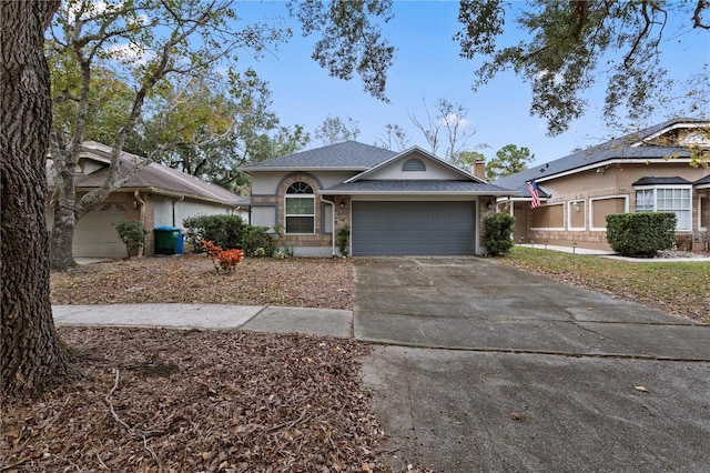 ranch-style home with a garage