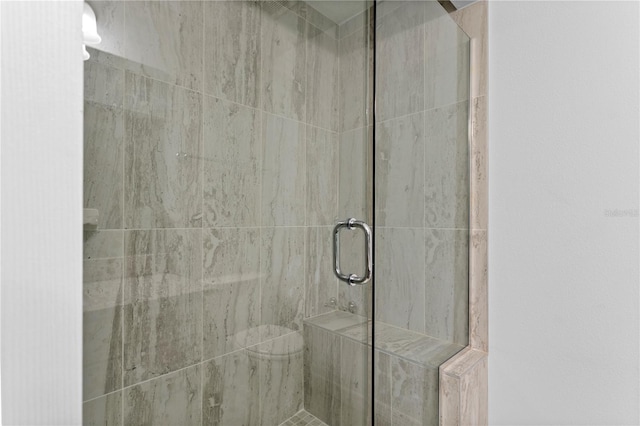 bathroom featuring walk in shower